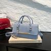 Simple foreign texture bag messenger bag women's 2025 spring new value solid color shoulder portable small square bag