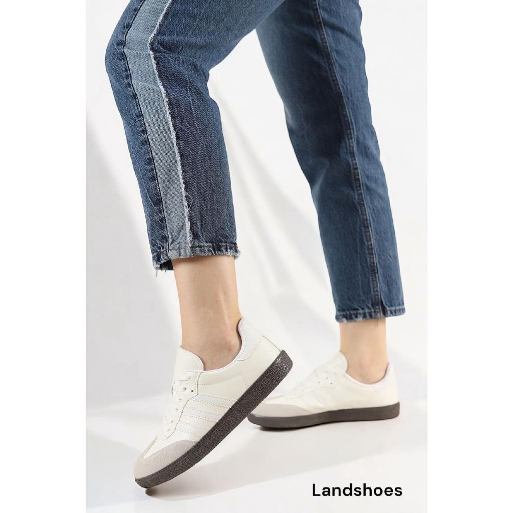 Бело-черные спортивные туфли унисекс в полоску на плоской подошве со шнуровкой