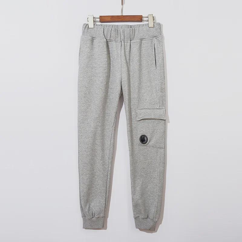 Спортивные брюки унисекс в функциональном стиле с несколькими карманами — в европейском и американском стиле
