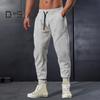 Spring Fall Men Pants Loose Drawstring Elastic Waist Pockets Ankle-banded Solid Color Patchwork Sport Trousers Daily Wear Harem Pants