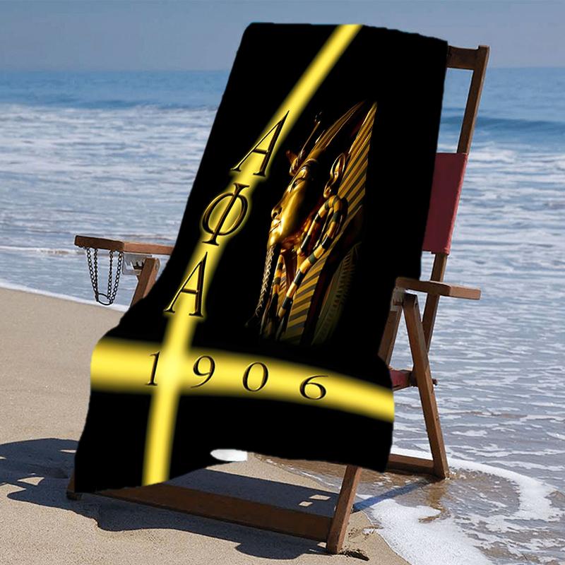 proof beach towel with a Alpha Phi Alpha logo pattern - soft,absorbent,quick-drying,machine washable - perfect for swimming,camping,bathing