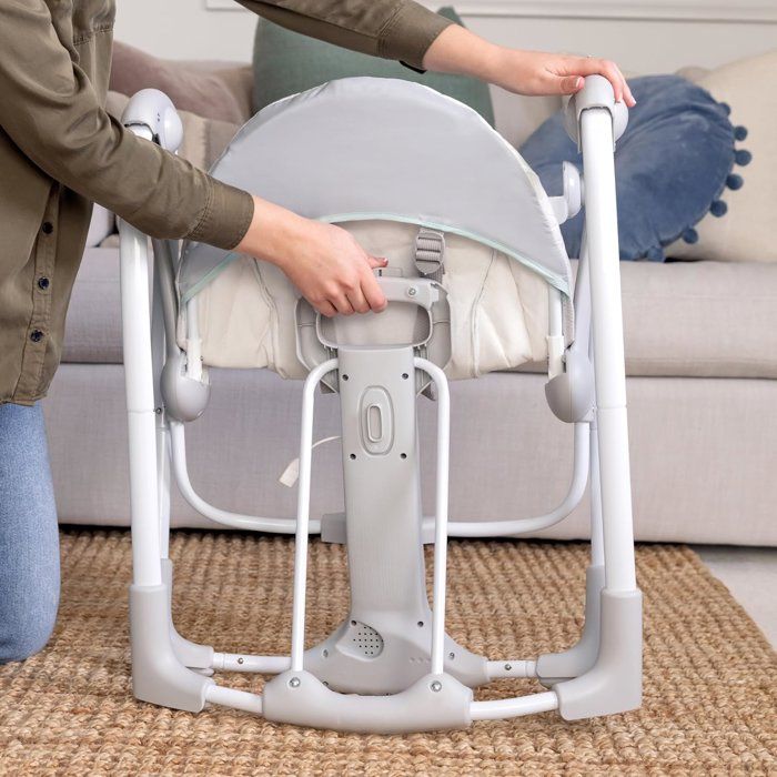 Ingenuity, Balancelle Portable Cozy Spot avec Arc d'Activités en Bois Amovible et Pivotant, pour les 0-9 Mois, Jusqu'à 9 kg