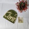 Street letter jacquard knitted hat women's autumn and winter windproof and warm headgear showing face small wool hat