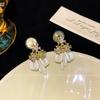 French zircon bow flower earrings, earrings clips, mosquito coil disc, no earholes, light luxury, high-end stud earrings, temperament earrings.