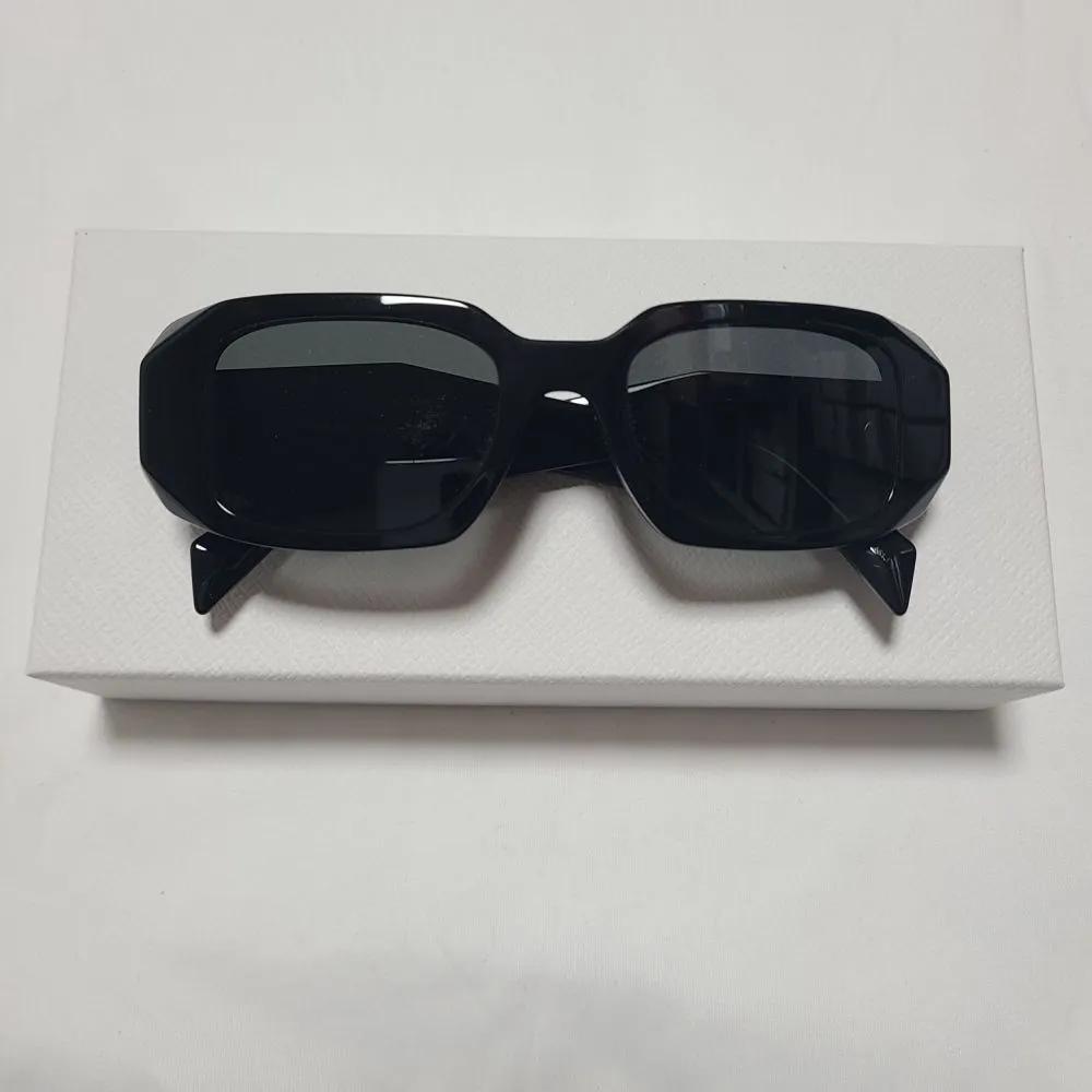Prada Symbol Sunglasses SPR17W-E1AB-F05S0-C-A051