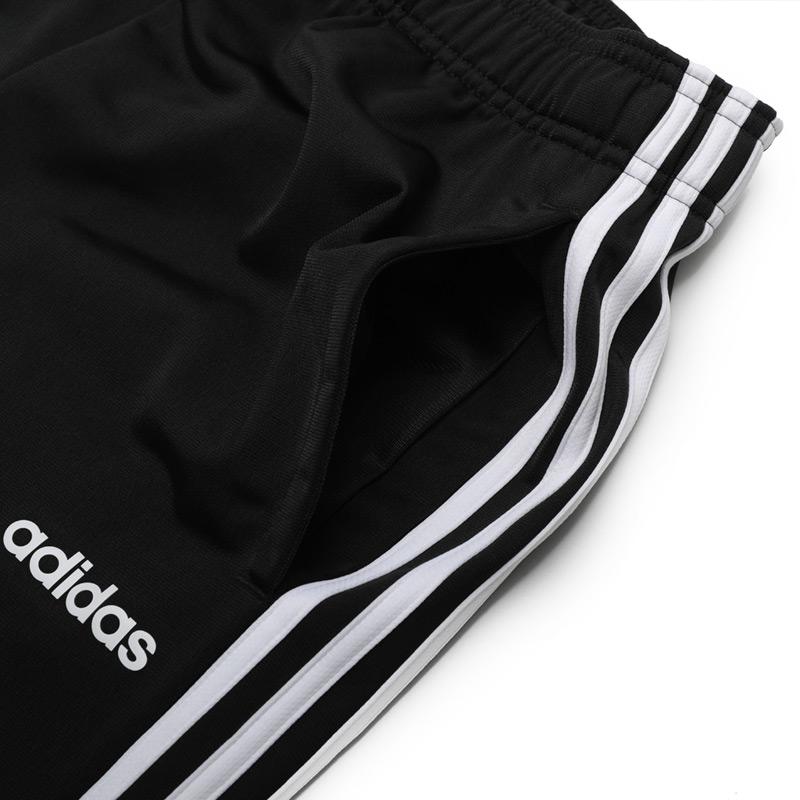 adidas Брюки из трикотажа Essentials с 3 полосками и открытым низом Черные EI9761