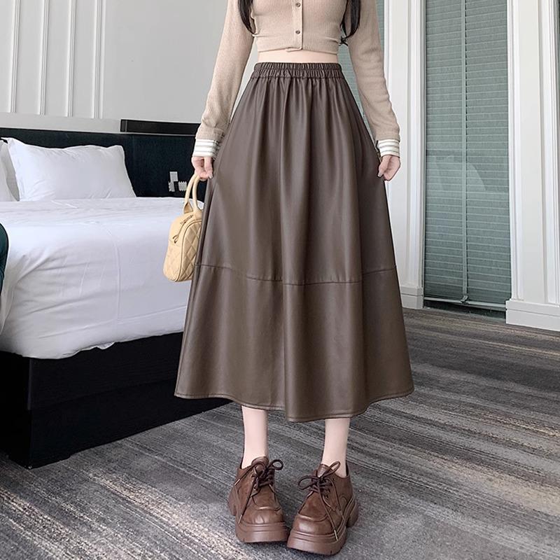 2024 Autumn/Winter PU Leather Mid-Length Skirt: Versatile Fashion Umbrella Design with Elastic Waist.