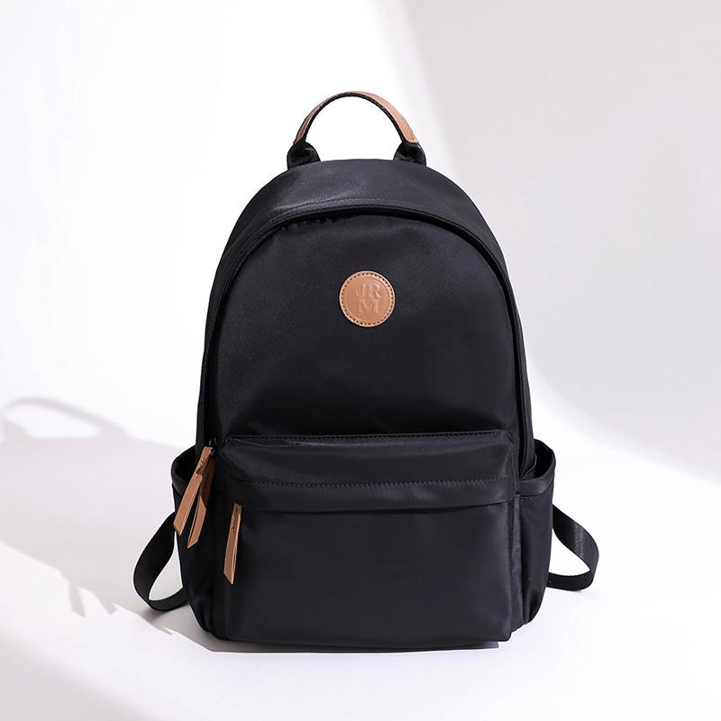 Large Capacity Oxford Cloth Backpack for Women Lightweight and Versatile New Commuting Backpack Korean Version Solid Color Travel Backpack