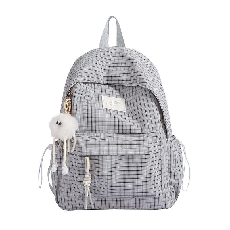 Schoolbag schoolbag female junior high school student high value plaid backpack autumn and winter new large capacity college student computer bag