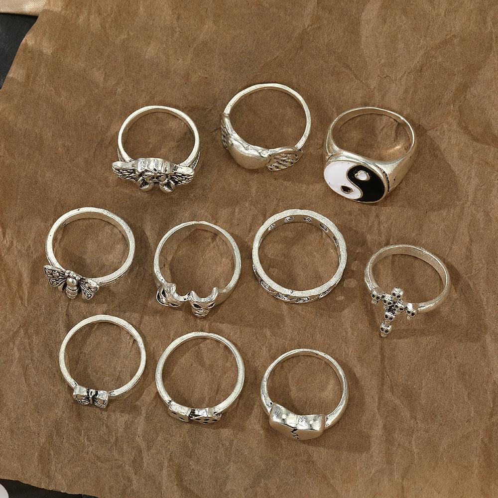 10 шт. набор колец с выдолбленным скелетом Тай Чи и бабочкой в ​​виде ангела любви и креста