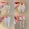High-end French Super Fairy Pearl Flower Fringed Earrings Women's Light Luxury Temperament Earrings Retro Petal Exaggerated Earrings