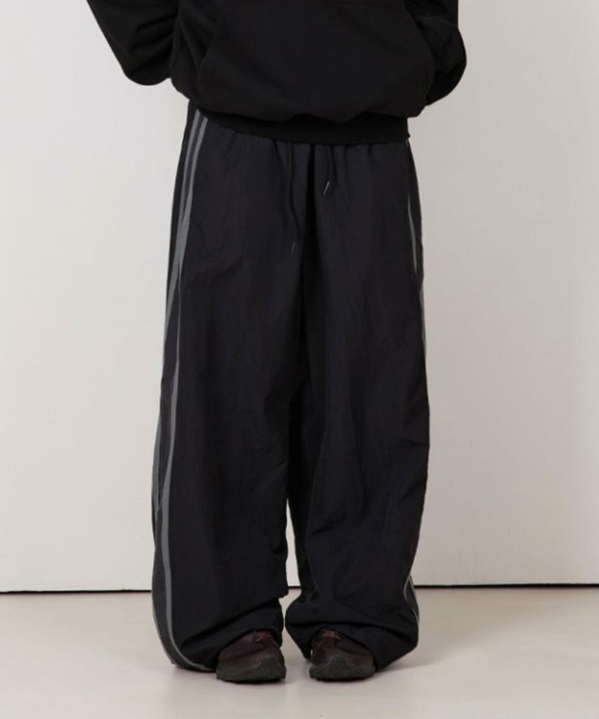BOUNDARY Side Color Block Tape Nylon Track Pants [Black]