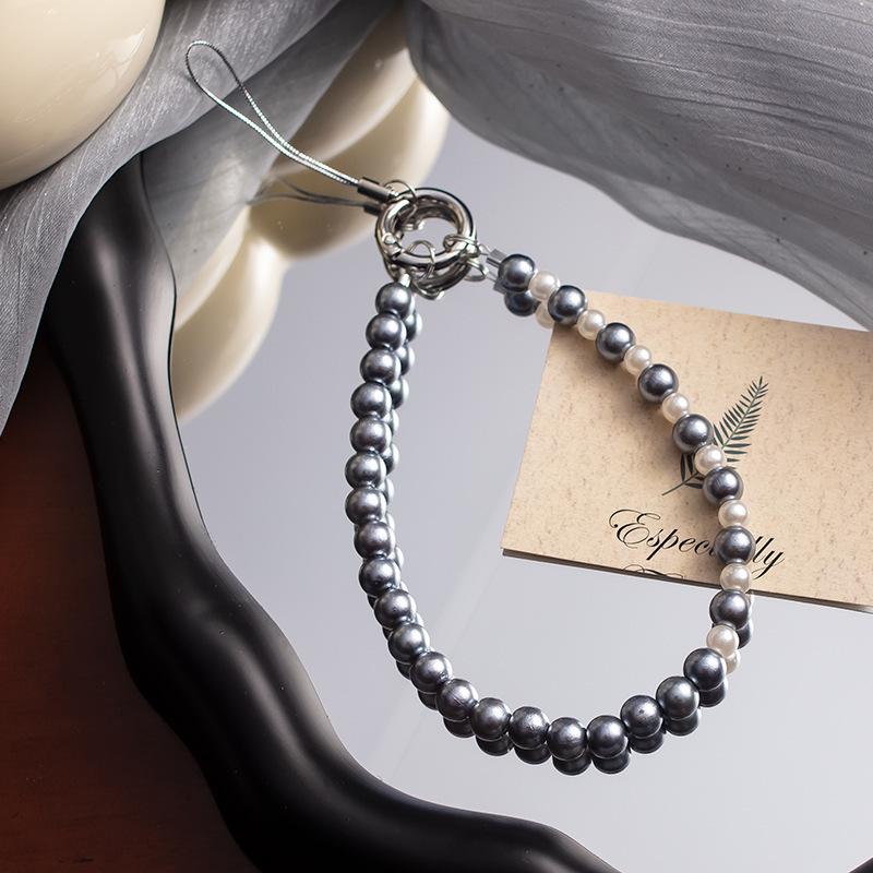 Жемчужный бант на запястье: Стиль Douyin, Защита от потери, Универсальная высококлассная цепочка из бусин для мобильных телефонов