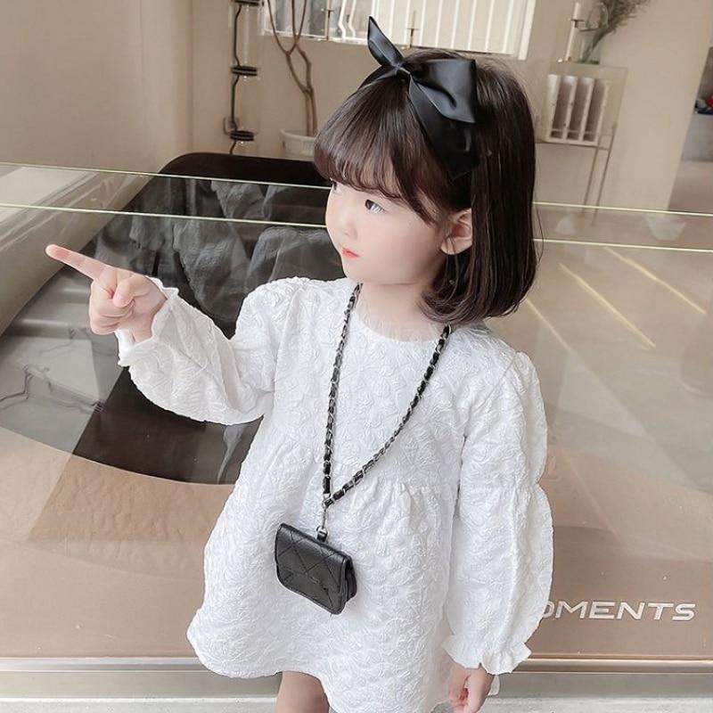 Девушка в западном стиле, сладкое жаккардовое платье с длинными рукавами и бантом