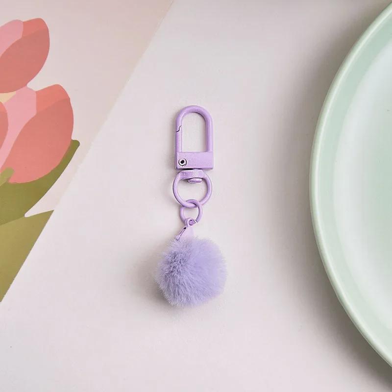Брелок для ключей в виде разноцветного плюшевого шарика с молочным кулоном, абажуром в виде макарон и вращающейся пряжкой.