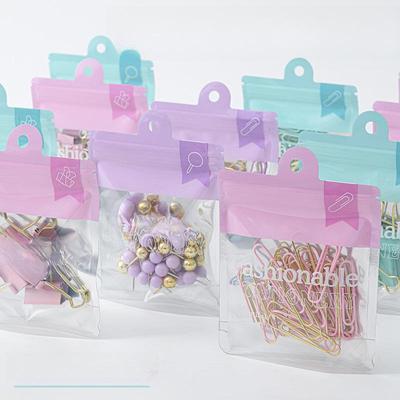 Новый офисный костюм цвета Macaron: Высококачественный, экономящий труд набор переплета и скрепок с длинным хвостиком