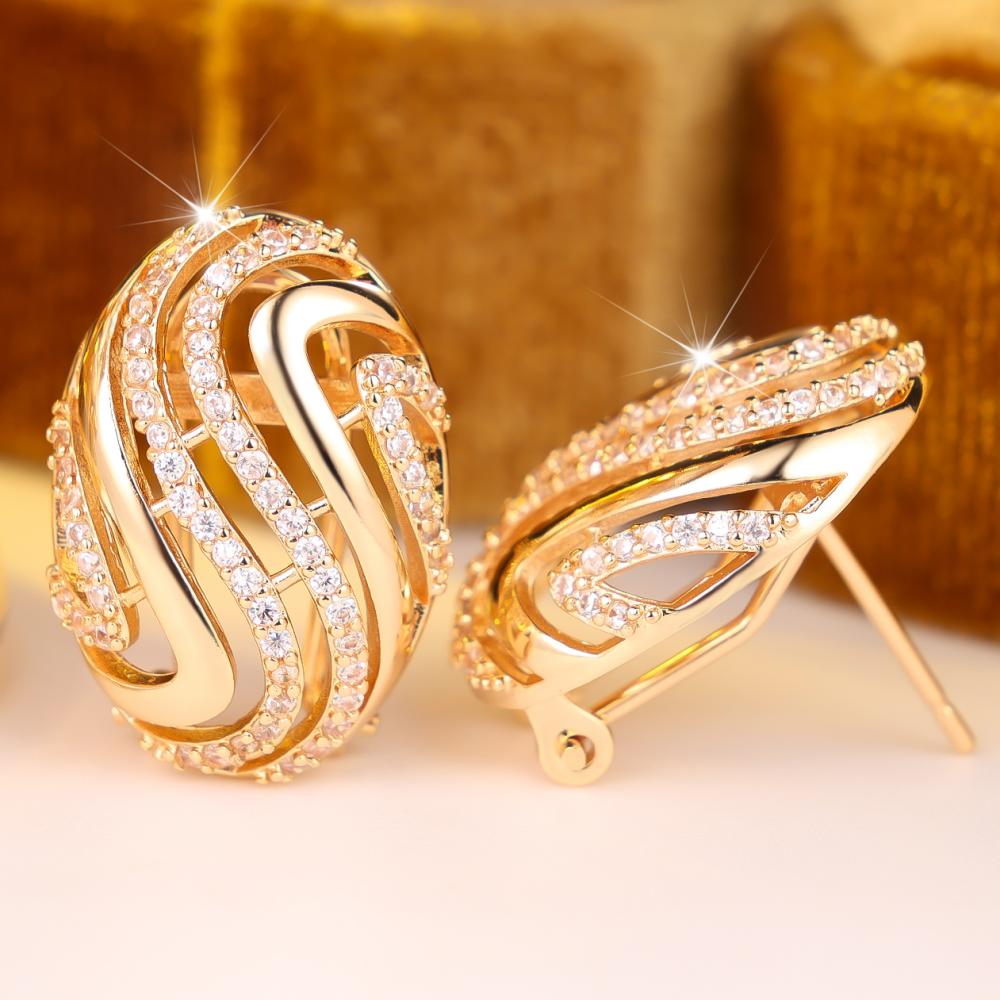 Luxury Gold Color Twisted Wave Shape White Zircon Paved Hollow Huggie Hoop Earrings for Women Gift
