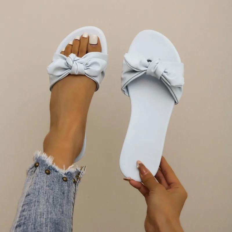 Модная обувь для женщин 2024 года, горячая распродажа, женские тапочки с открытым носком, летние однотонные повседневные пляжные тапочки на плоской подошве, удобные тапочки