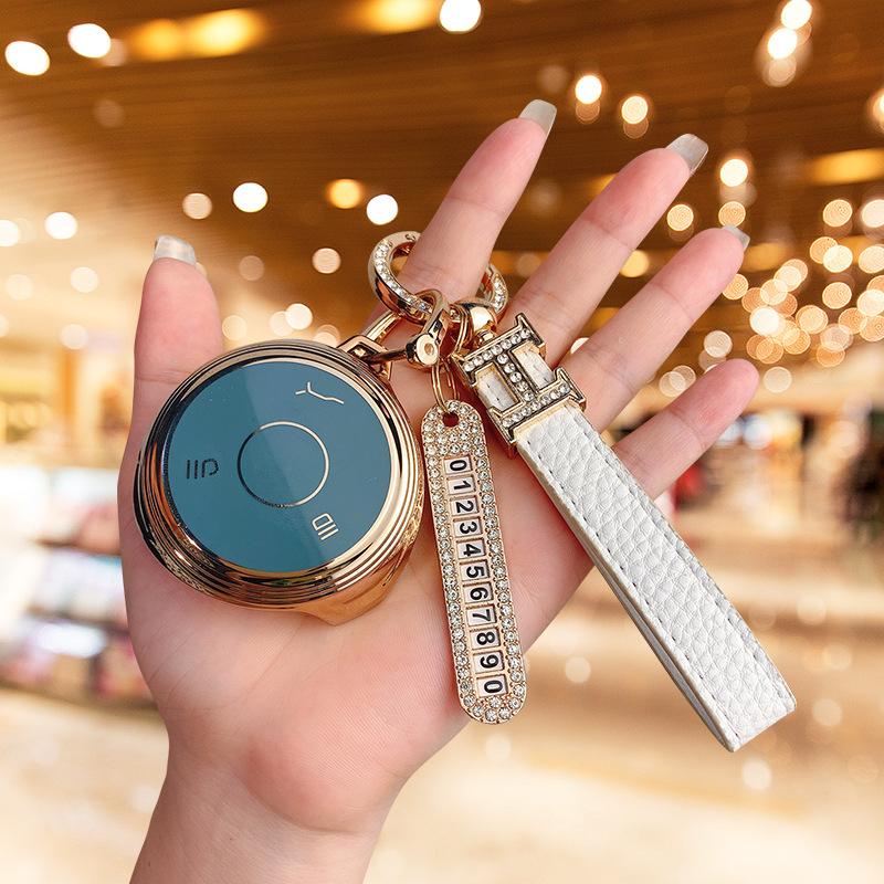 Подходит для автомобиля Nezha V, сумка для набора ключей Nezha U Pro, защита высокого класса, персонализированная пряжка против падения, корпус для новой энергии для мужчин и женщин