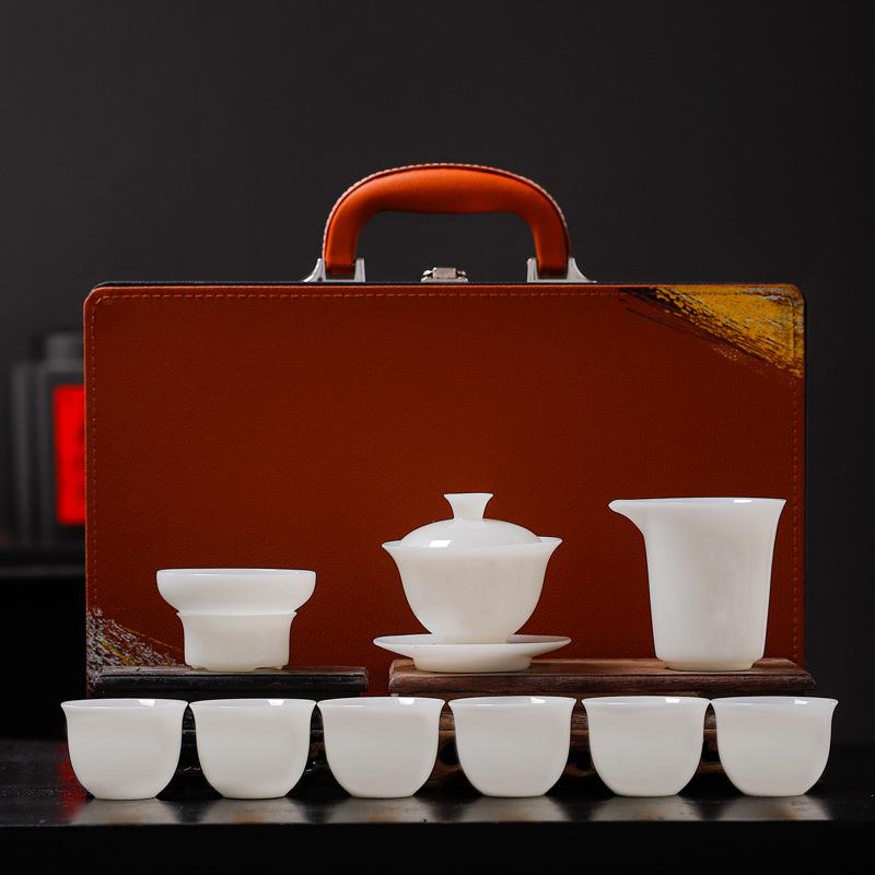 Pu jade porcelain kung fu tea set, household simple business gift gift box, suet jade white porcelain tea set with hand gift