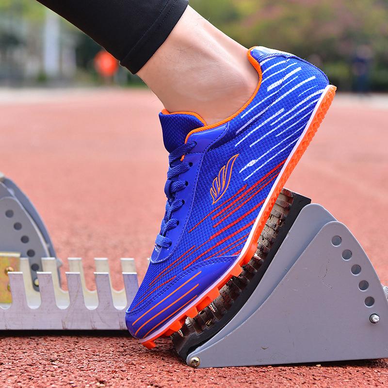 Горячие продажи Мужские и женские кроссовки для легкой атлетики с низким вырезом на шнуровке дышащие кроссовки молодежная мода ультра легкие профессиональные шипованные туфли