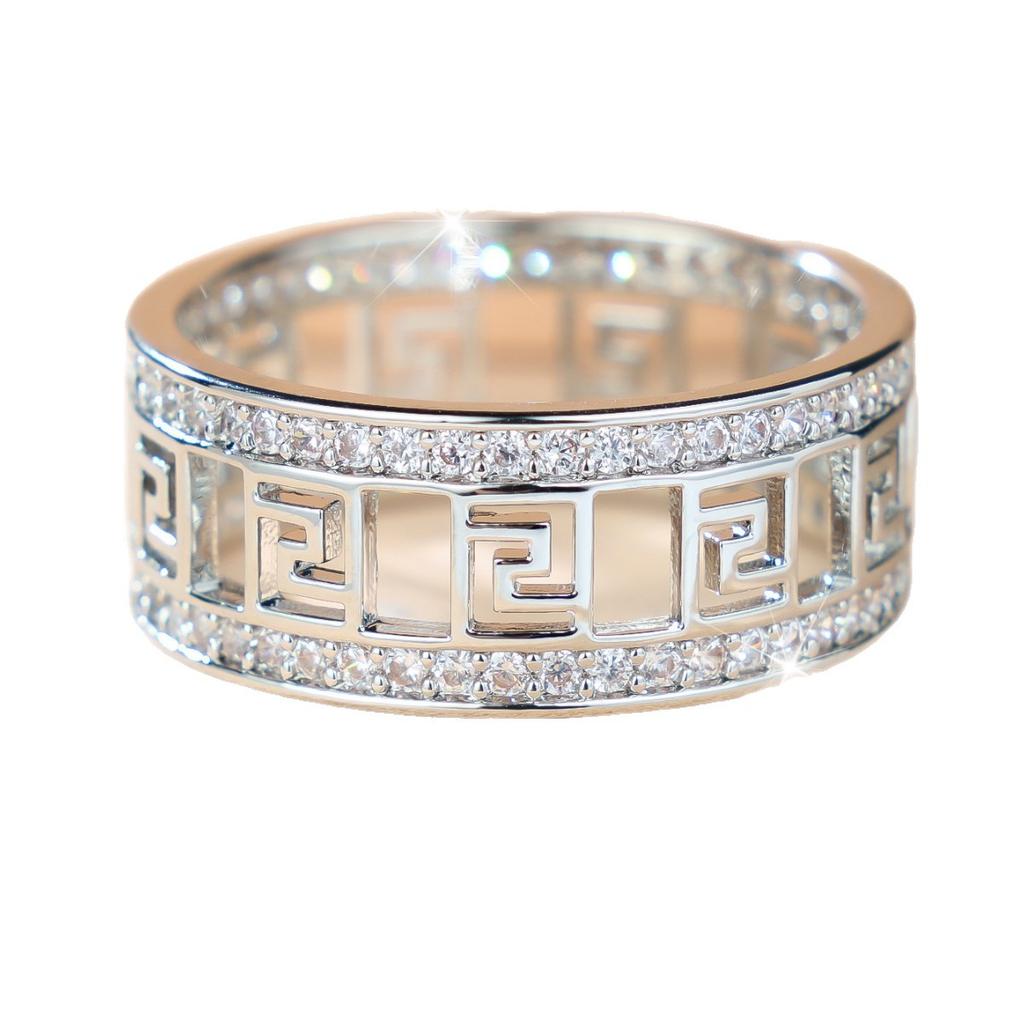 Light luxury diamond ring with hollowed-out design and diamond inlay Vintage-style gold zircon ring Unisex high-end jewelry