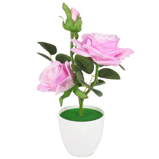 Длительное поддельное растение в горшке отрезало равномерно декоративную портативную машинку