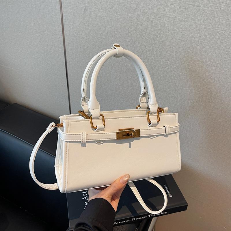 Корейская версия простой и универсальной нишевой портативной сумки-мессенджера для поездок на работу, женская, новая коллекция осень-зима 2025, высококачественная текстурированная сумка-тоут