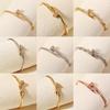 Elegant Copper Zircon Buckle Nail Bracelet - High-End Open Bangle Design
