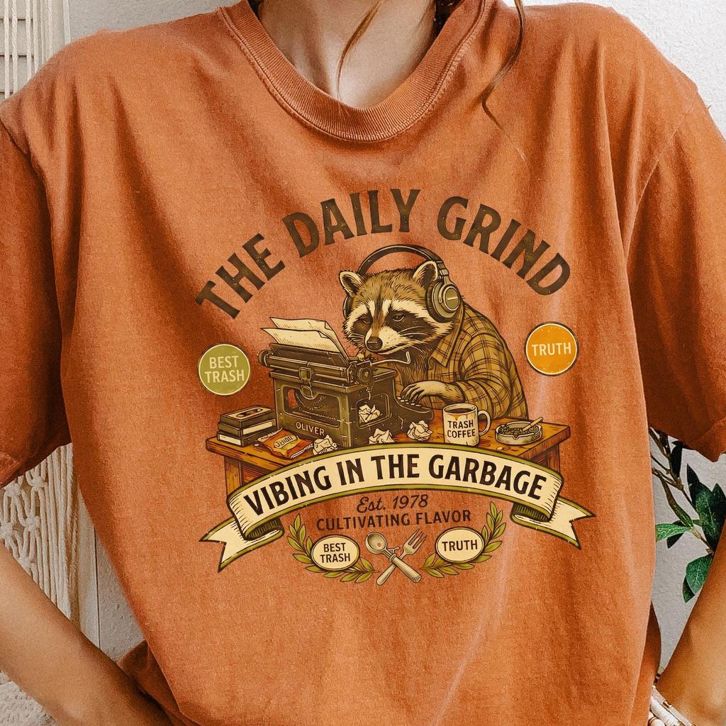The Daily Grind Coffee Raccoon T-shirt | Vibing in the Garbage graphic tee