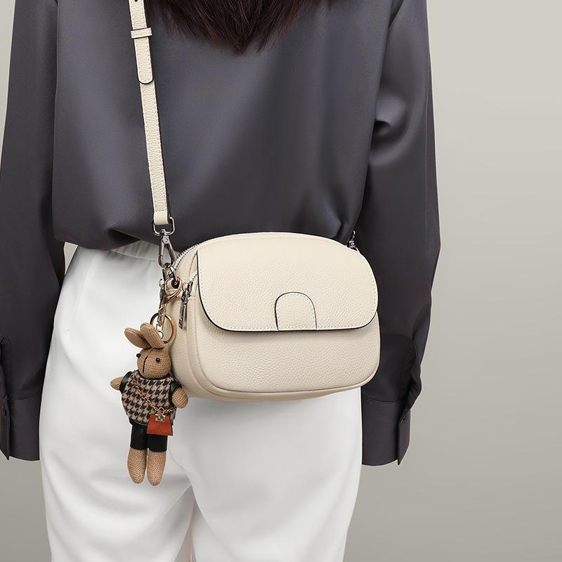 Новая женская сумка из натуральной кожи, сумка через плечо, маленькая круглая сумка, легкая, роскошная, нишевая, высококачественная сумка через плечо