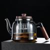 Прозрачный стеклянный чайник с ручкой из грецкого ореха