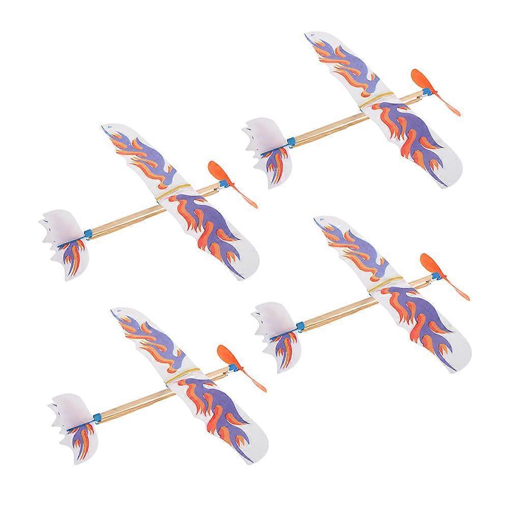 4pcs Flying Glider Plane: Rubberband Powered Airplane Kits Windup Copter Toys for Kids Party Favors Boys and Girls Outdoor Fun and DIY Activities