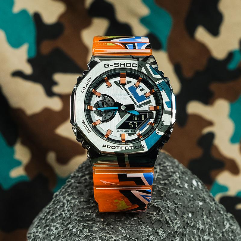 Casio 40-летие First Street Graffiti Повседневная Мода Спорт Водонепроницаемый Кварцевый Механизм Кварцевый Механизм Ремешок из Смолы Японский GM-2100SS-1APR