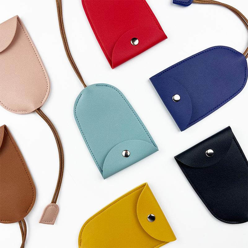 "Compact PU Leather Key Storage Pouch with Pull-Out Feature"