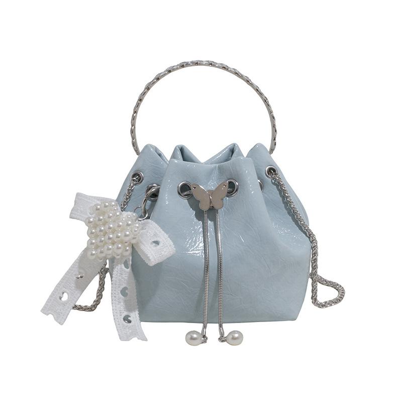 Нишевая дизайнерская сумка женская 2025 новая летняя модная портативная сумка-ведро, универсальная сумка-мессенджер на цепочке для通勤