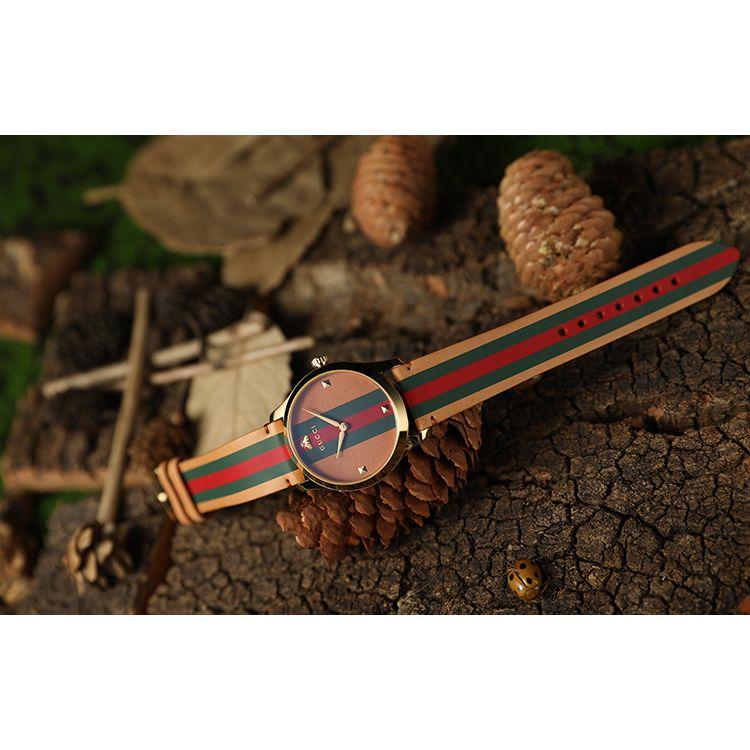 Gucci Часы серии G-Timeless Кварцевый механизм Кожаный ремешок Коричневый циферблат Винтажный Красная и зеленая пчела Унисекс часы YA1264077