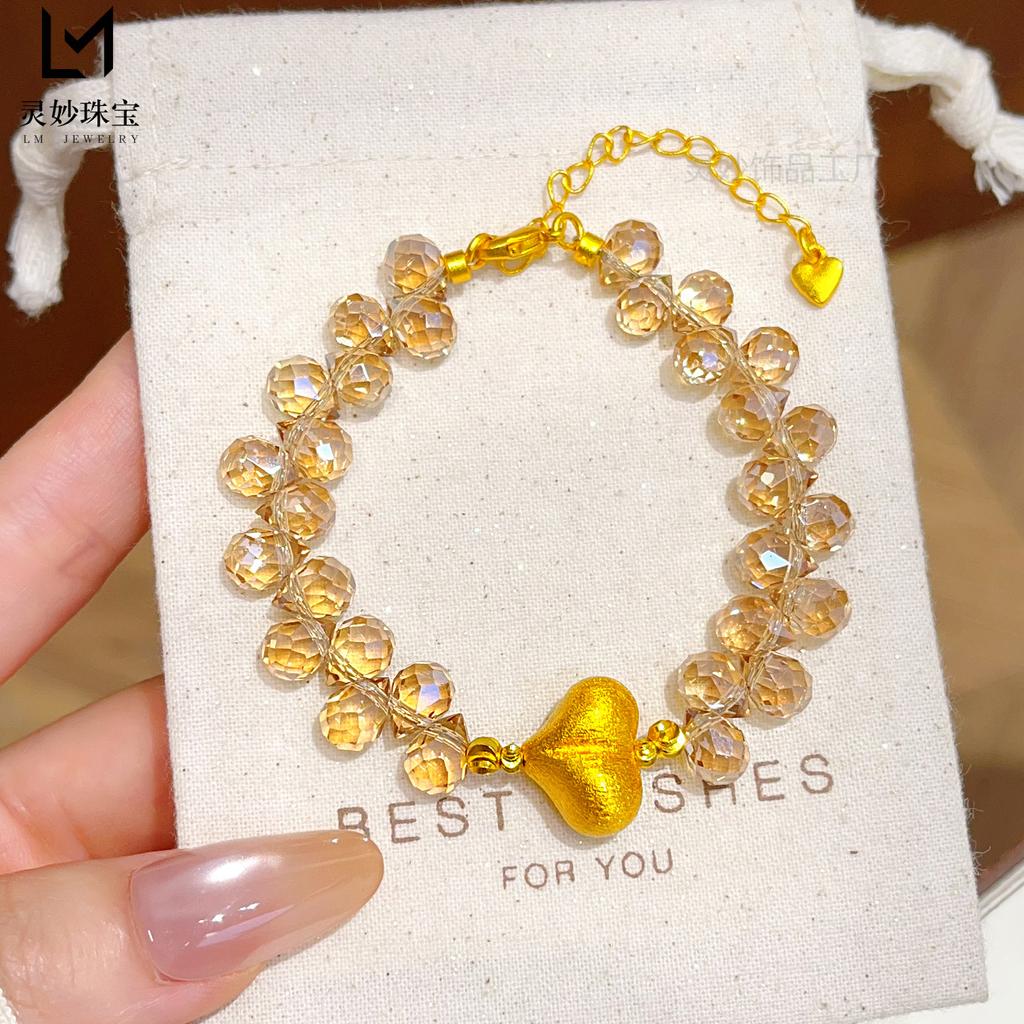 Shiny gold-plated peach champagne water drop bracelet with frosted heart-shaped lucky beads, exquisite and stylish, a gift for a girlfriend