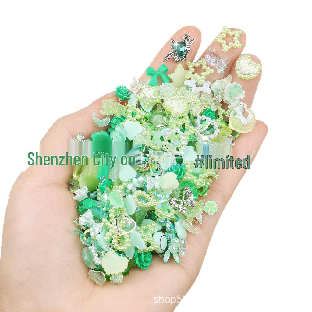650PCS Mixed Nail Art Kit: Bows, Chrome Hearts, Pearls, Rivets, and Fairy Style Colors.