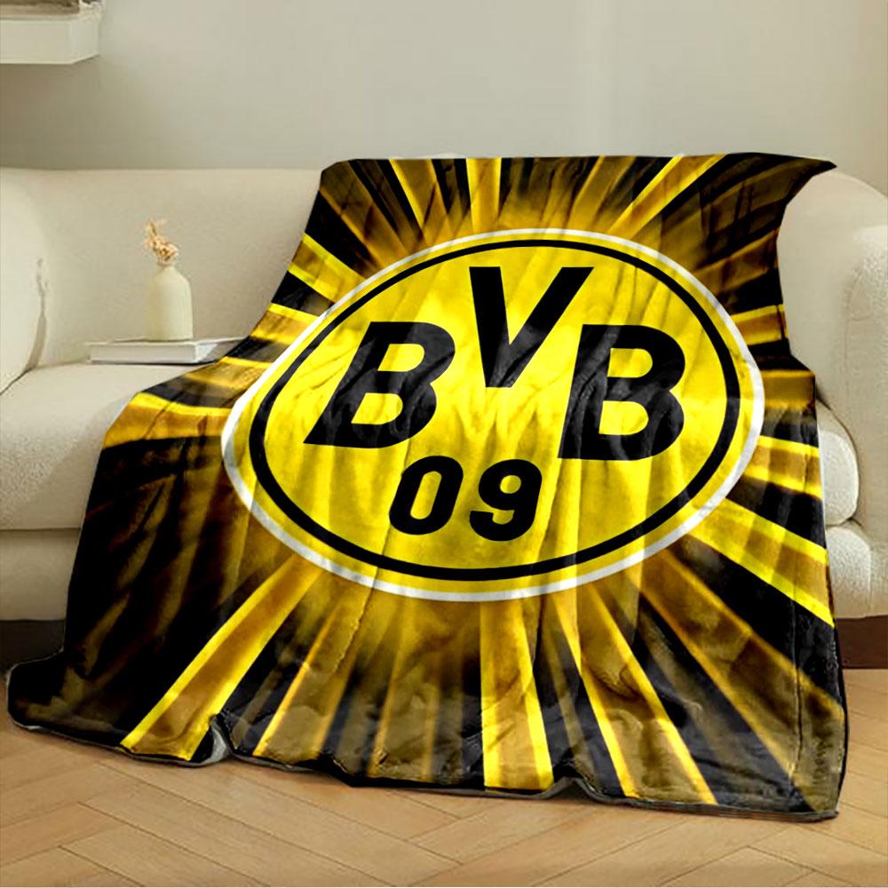 Yellow circular logo with "BVB 09" text, surrounded by radial light streaks. for all seasons blanket lunch break throw gift