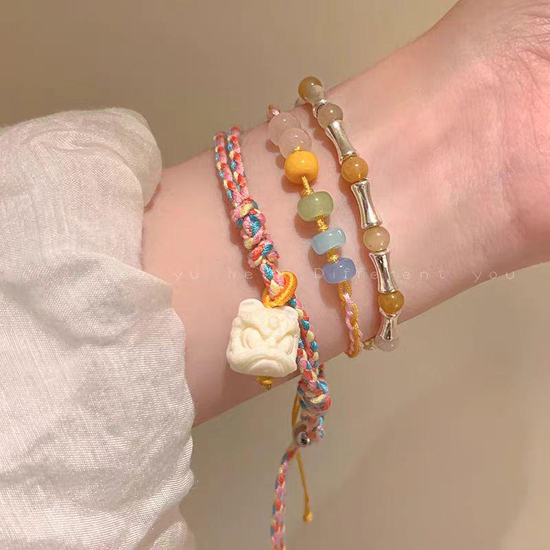 Elegant Bamboo Braided Lion Dance Bracelet - Niche Design, High-End Beaded Jewelry for Women and Students