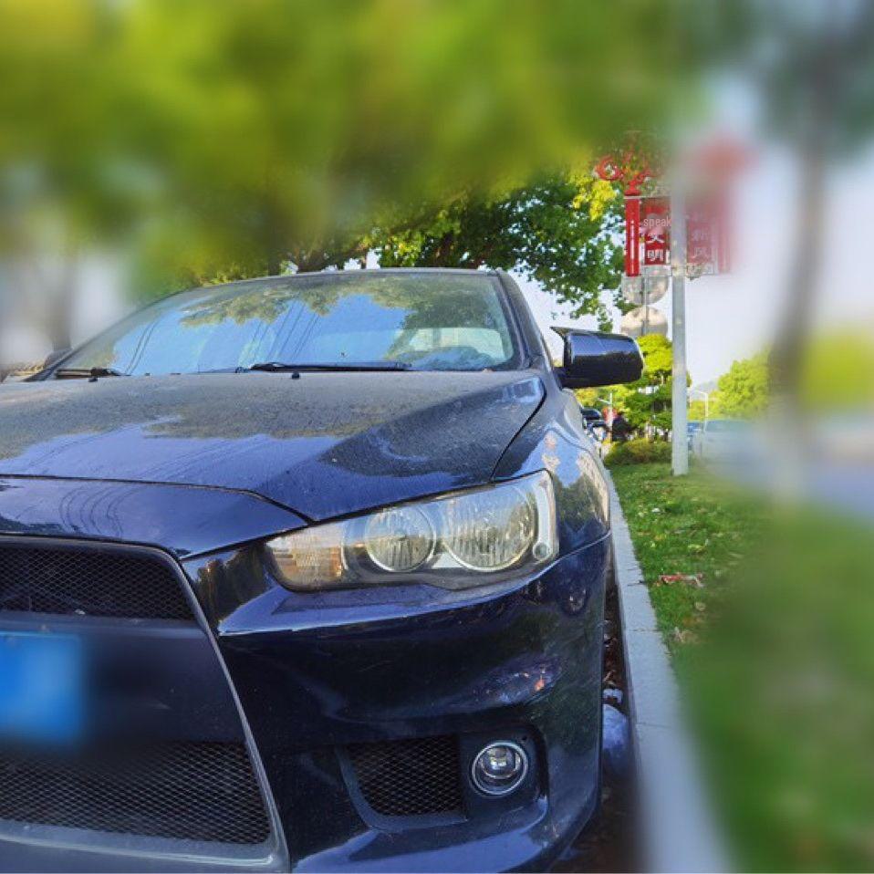 Защитный чехол из углеродного волокна для зеркала заднего вида Mitsubishi Lancer 08-12.