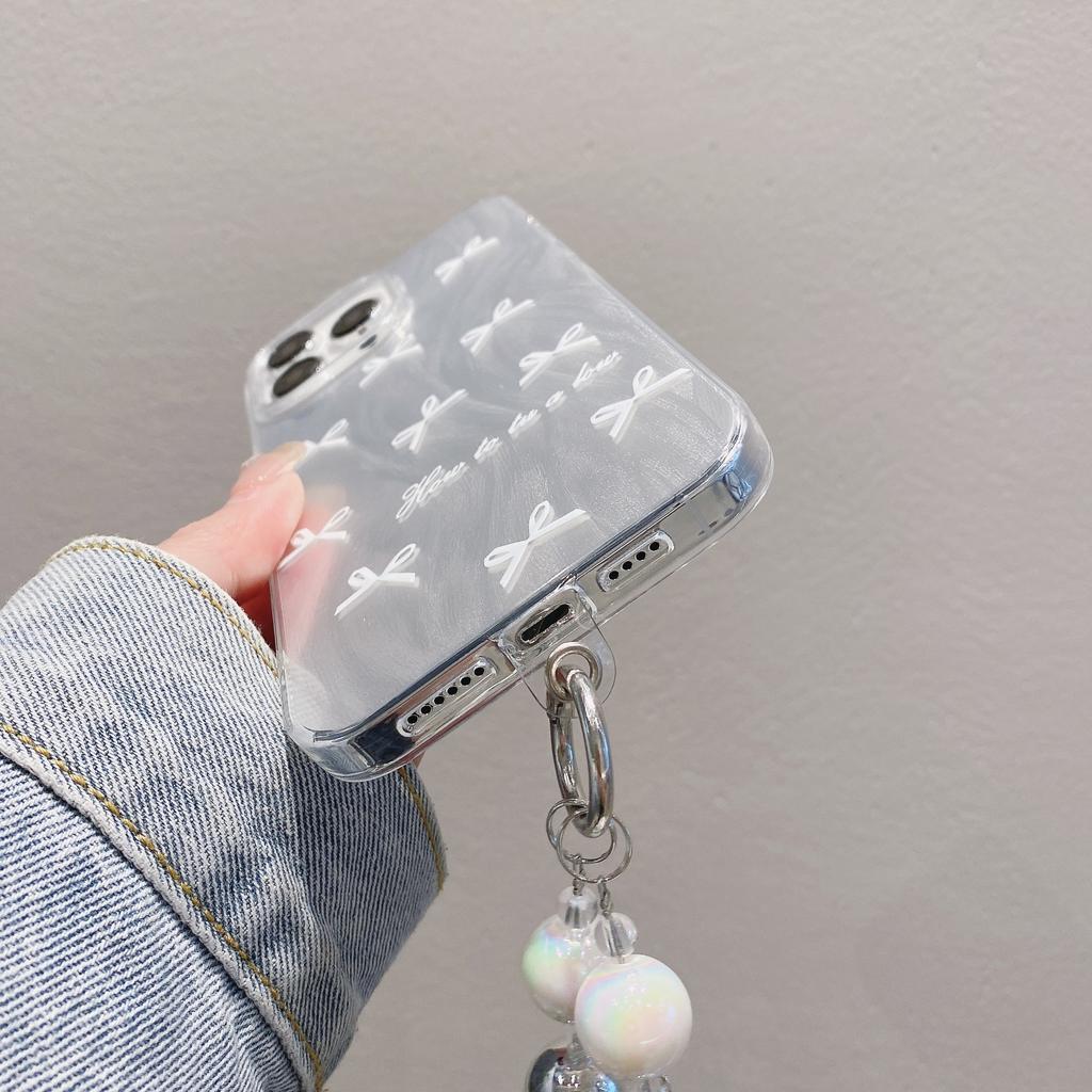 Suitable for Apple 15pro Bracelet Bow Protective Cover for IPhone 11 Laser 14 Feather Yarn Mobile Phone Case 16