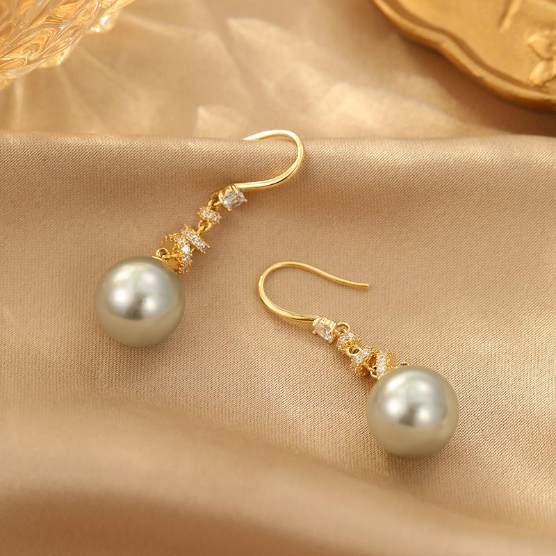Ретро изысканные нишевые жемчужные серьги женские французские длинные темпераментные серьги 2024 популярные серьги в стиле легкой роскоши