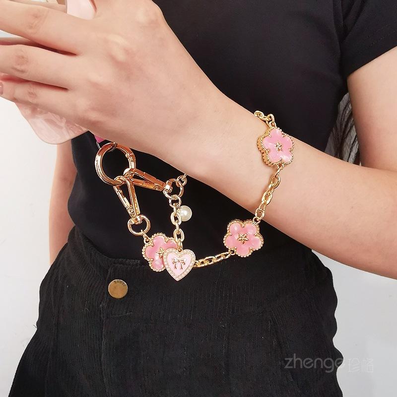 Flower love pendant metal mobile phone chain women's ins fashion hand wrist pendant lanyard mobile phone lanyard short