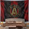 Vertical red and black stripes with a gold circular emblem in the center. Patterned tapestry for bedroom and living room home decor