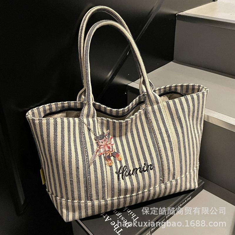 Холщовая сумка-мессенджер класса Commuter Женская большой вместимости 2025 Новая Повседневная Весна и Лето Универсальная Премиальная Сумка-тоут на плечо