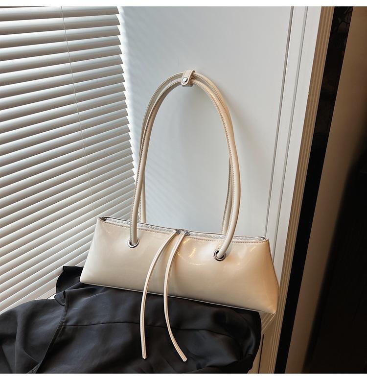 Сумка премиум-класса большой вместимости женская 2025 новая нишевая модная универсальная сумка-багет на одно плечо под мышкой