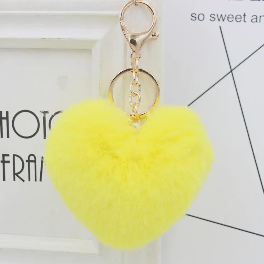 "Charming Heart-Shaped Rabbit Fur Keychain - Fashionable Fluffy Accessory for Ladies' Bags"