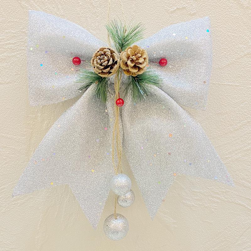 Золотой блестящий бант с украшениями: Большое, разноцветное рождественское украшение в виде елки